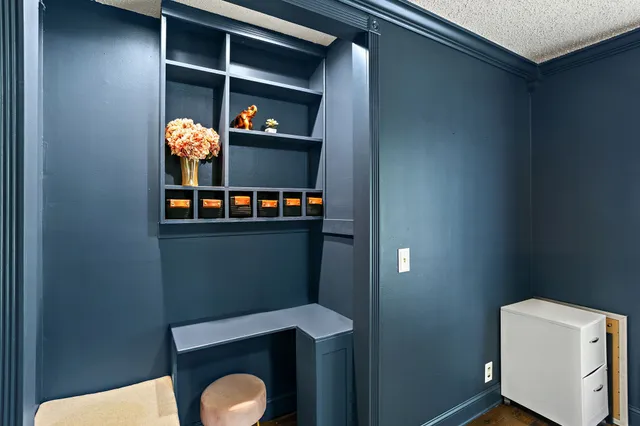 a view of a two chairs in the roof deck