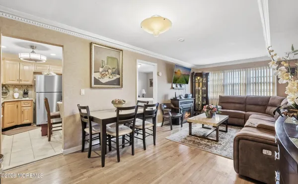 a view of a livingroom with furniture and window