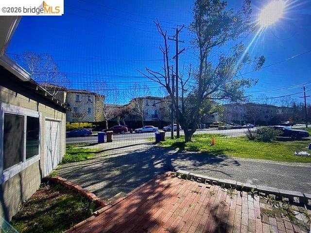 230 Cleaveland Road Pleasant Hill, CA 94523 - Photo 5 of 8 a view of a backyard with wooden fence