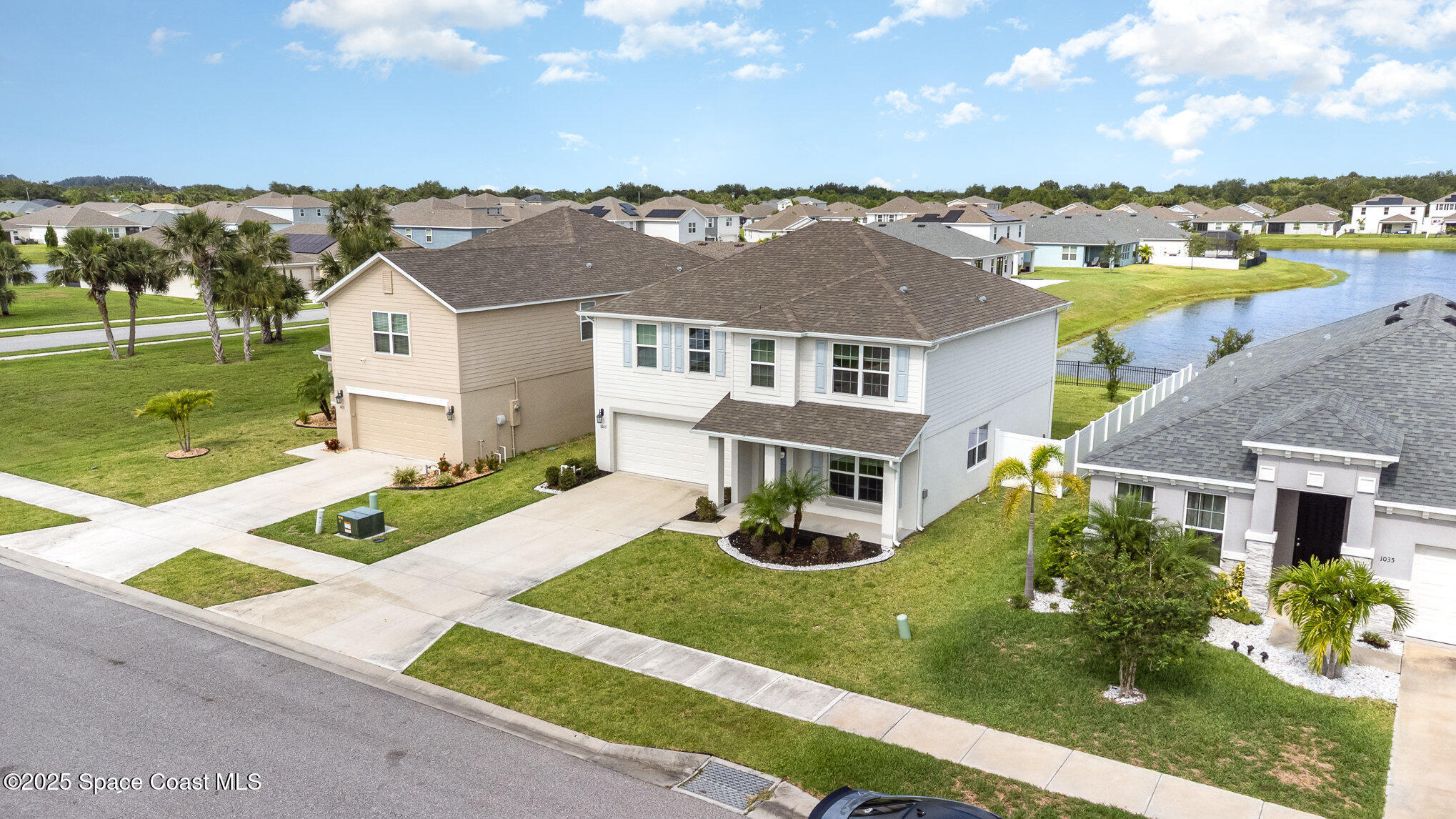 1043 Corbin Circle Southwest Palm Bay, FL 32908 - Photo 2 of 30 002_dji_0633-edit_88