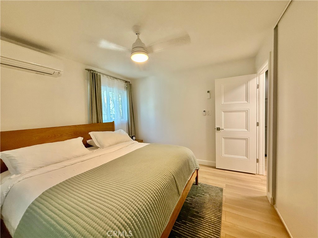 730 Via Altamira Montebello, CA 90640 - Photo 19 of 27 a bedroom with a bed and a mirror