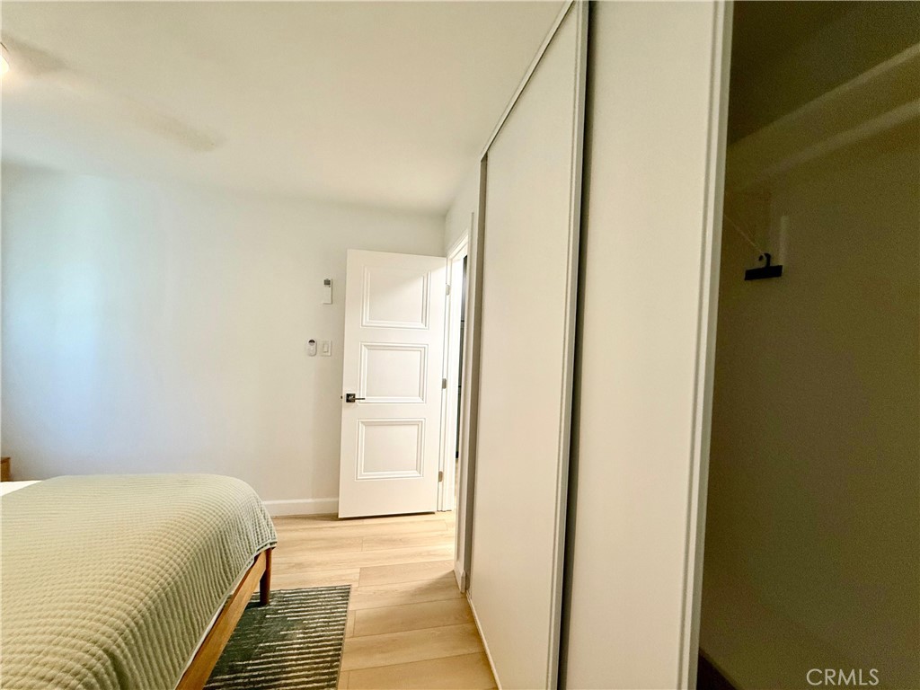 730 Via Altamira Montebello, CA 90640 - Photo 21 of 27 a bedroom with a bed and a mirror