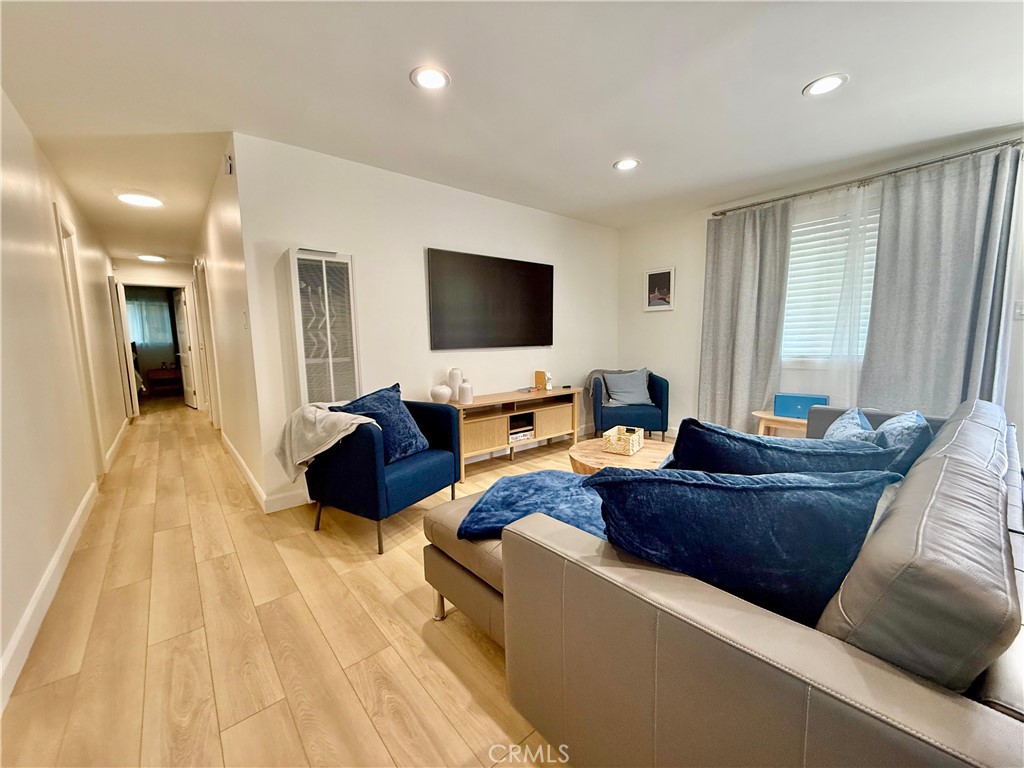 730 Via Altamira Montebello, CA 90640 - Photo 10 of 27 a living room with furniture and a flat screen tv