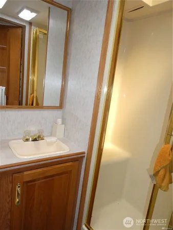 a bathroom with a sink and a mirror