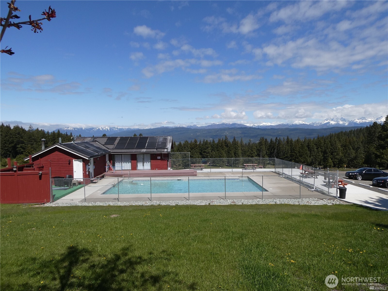 831 Horse Heaven Road Cle Elum, WA 98922 - Photo 29 of 32 a view of a house with pool and a yard