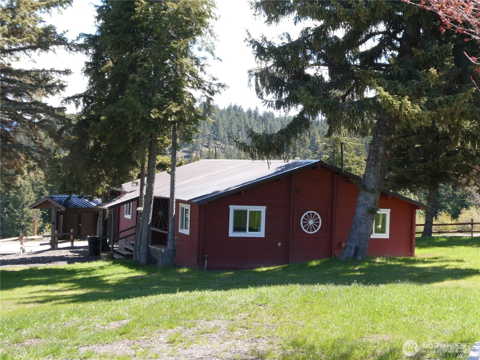 831 Horse Heaven Road Cle Elum, WA 98922 - Photo 30 of 32 a view of a house with a yard