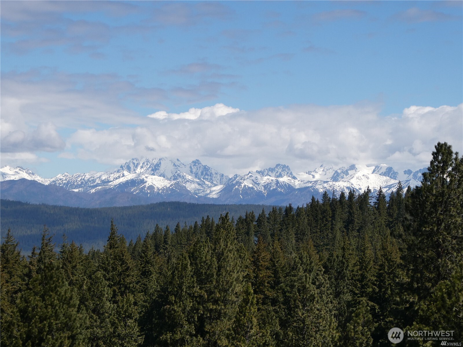 831 Horse Heaven Road Cle Elum, WA 98922 - Photo 6 of 32 a view of a town with mountains in the background