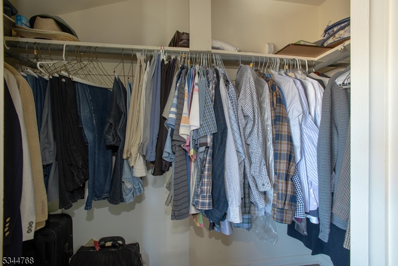 5 Marine Terrace Sparta, NJ 07871 - Photo 24 of 48 a view of walk in closet with clothes and shoes