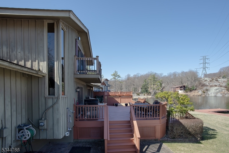 5 Marine Terrace Sparta, NJ 07871 - Photo 43 of 48 a view of a chair and table in the balcony