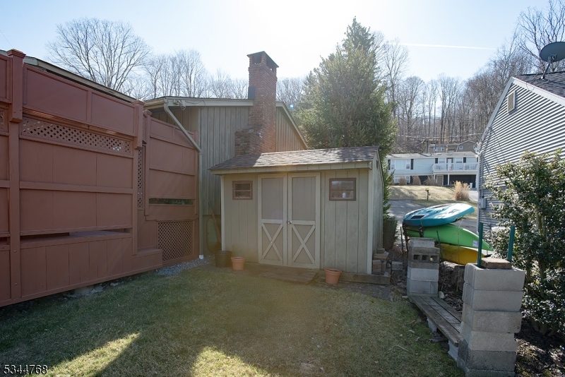 5 Marine Terrace Sparta, NJ 07871 - Photo 48 of 48 a view of a house with a yard and seating space