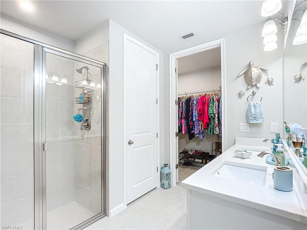 4664 Arboretum Circle, Unit 101 Naples, FL 34112 - Photo 30 of 48 a view of bathroom
