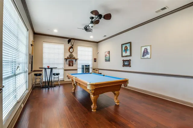 a room with furniture and wooden floor