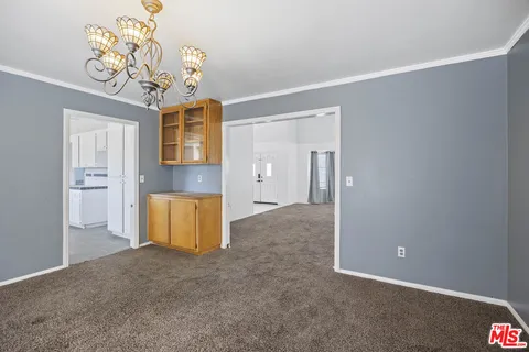 a view of a livingroom with a chandelier