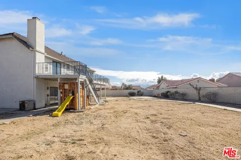 a view of a house with a snow