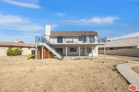 a view of a house with a patio