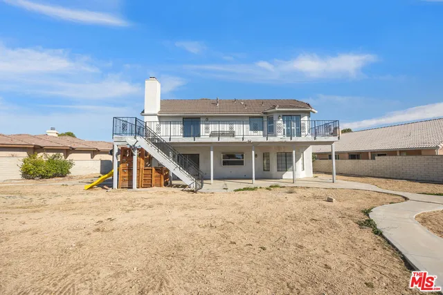 a view of a house with a patio