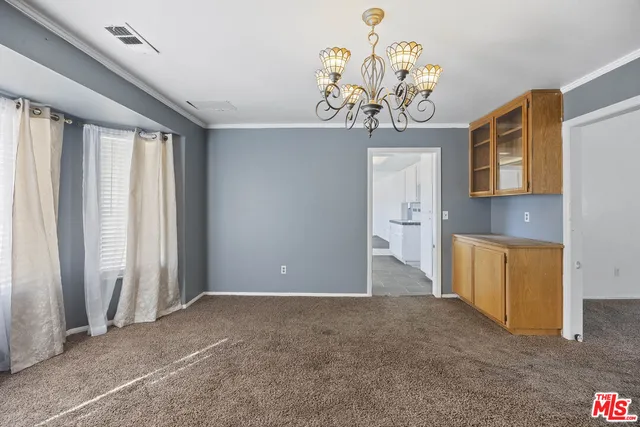 a view of a livingroom with a chandelier