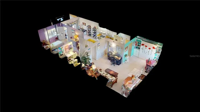 a bed sitting in a bedroom next to a lamp