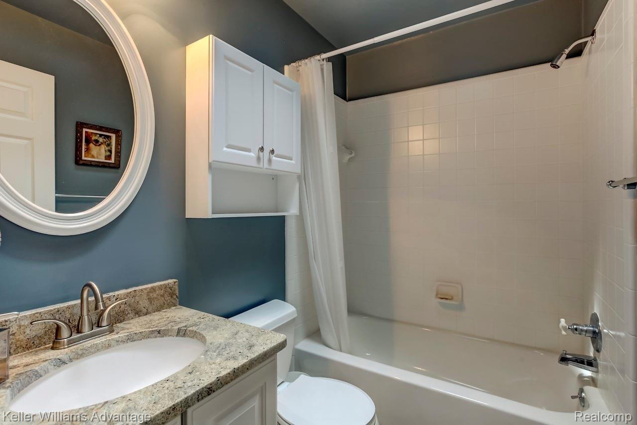 4558 Vines Road Howell, MI 48843 - Photo 16 of 46 Full bath off of the kitchen.