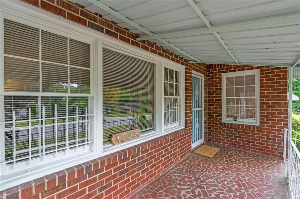 1766 Brewer Boulevard Southwest Atlanta, GA 30310 - Photo 25 of 30 a view of front door with wooden floor