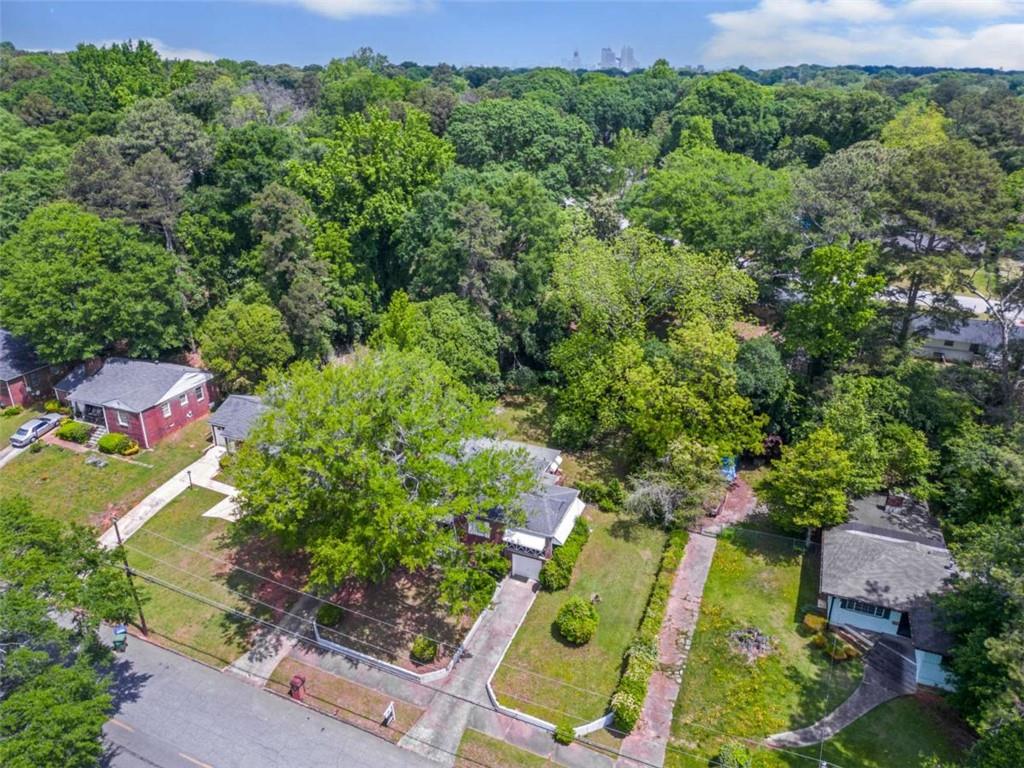 1766 Brewer Boulevard Southwest Atlanta, GA 30310 - Photo 29 of 30 an aerial view of a house with a yard basket ball court and a fountain