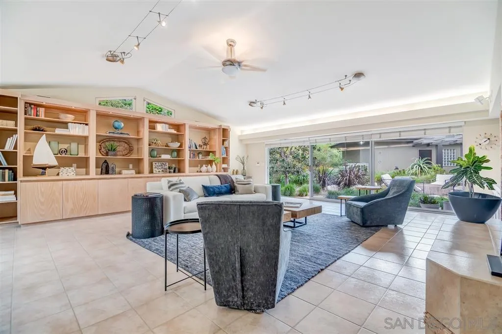 1615 Lugano Lane Del Mar, CA 92014 - Photo 14 of 25 a living room with furniture and a potted plant