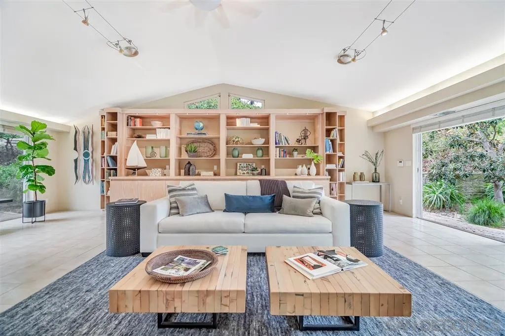 1615 Lugano Lane Del Mar, CA 92014 - Photo 15 of 25 a living room with furniture and a large window