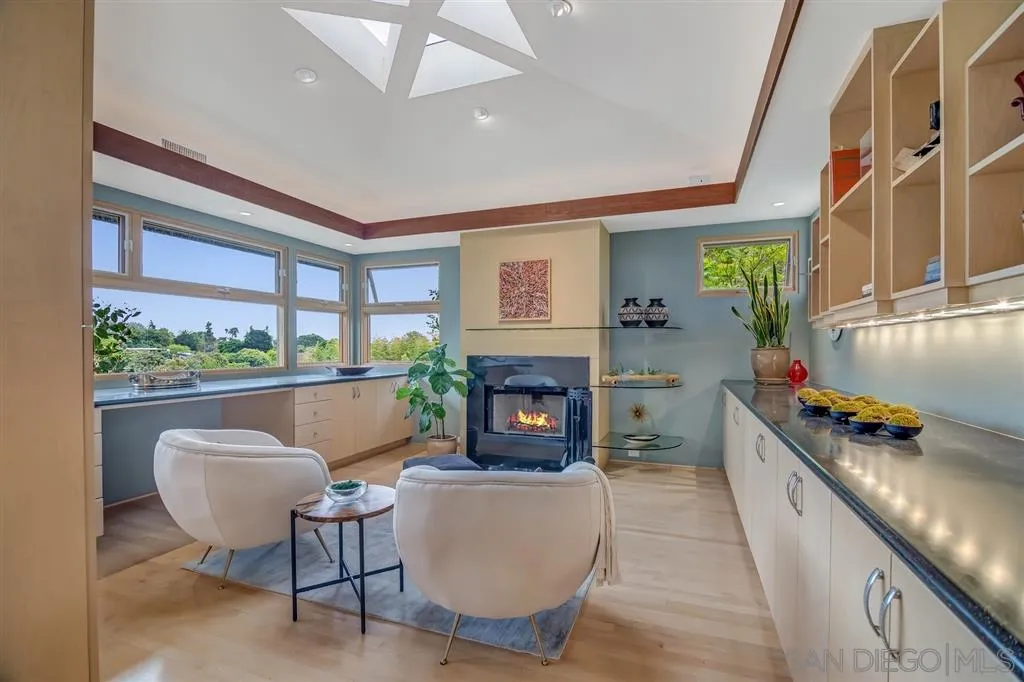 1615 Lugano Lane Del Mar, CA 92014 - Photo 19 of 25 a living room with furniture and a fireplace