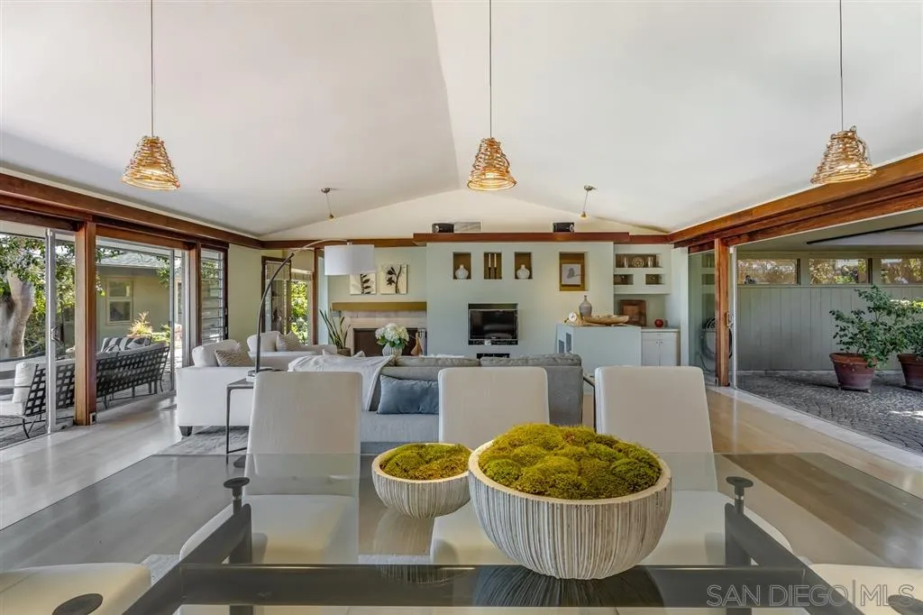 1615 Lugano Lane Del Mar, CA 92014 - Photo 21 of 25 a living room with a couch and a large window