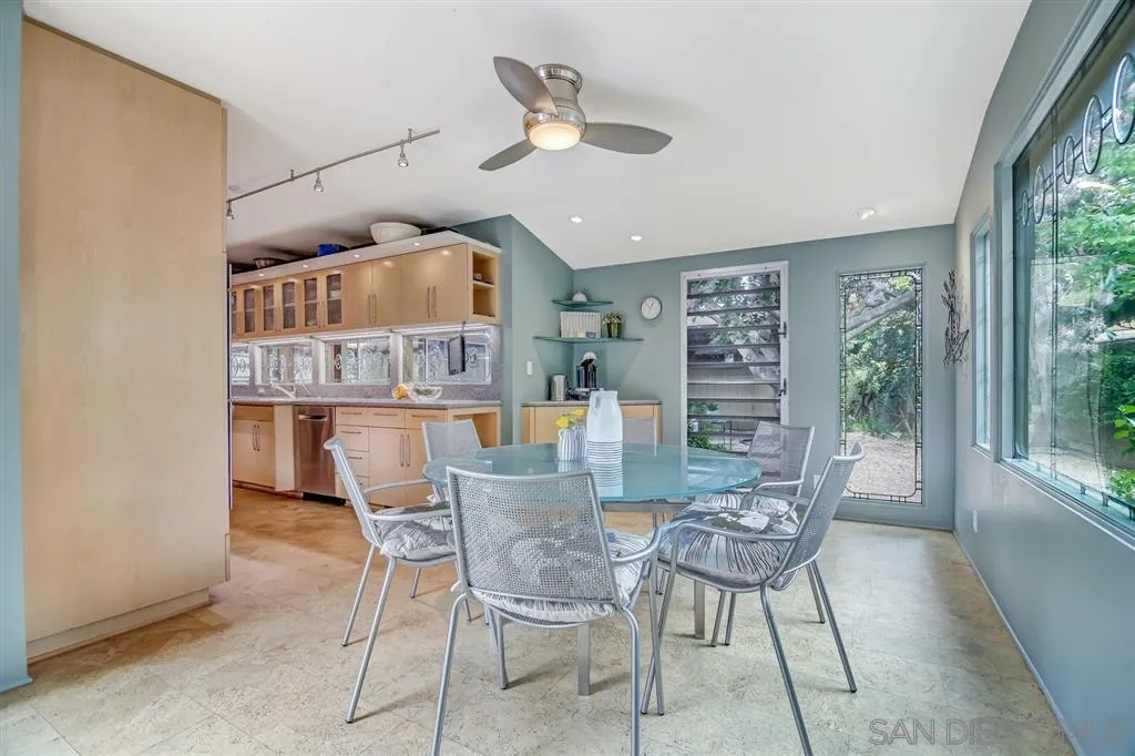 1615 Lugano Lane Del Mar, CA 92014 - Photo 5 of 25 a dining room with furniture and window