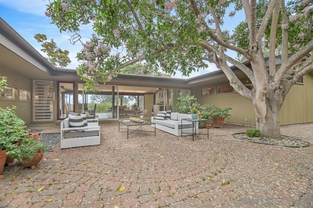 1615 Lugano Lane Del Mar, CA 92014 - Photo 6 of 25 a view of a house with backyard and sitting area