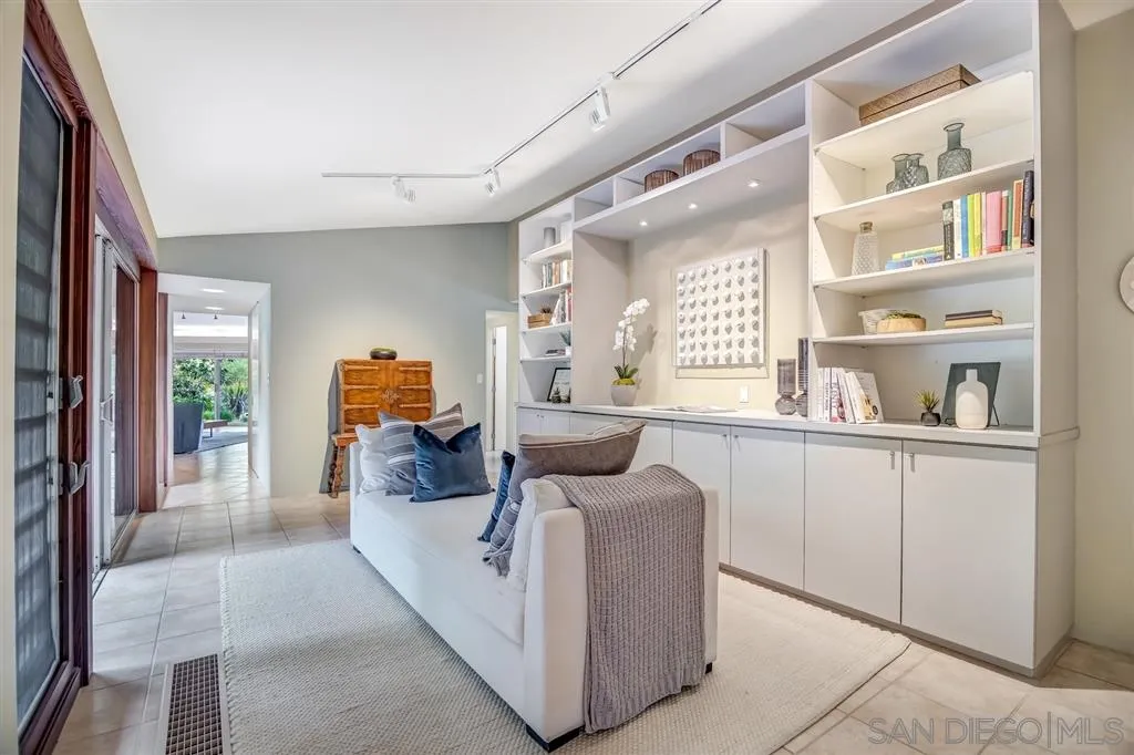 1615 Lugano Lane Del Mar, CA 92014 - Photo 10 of 25 a living room with furniture and a wooden floor