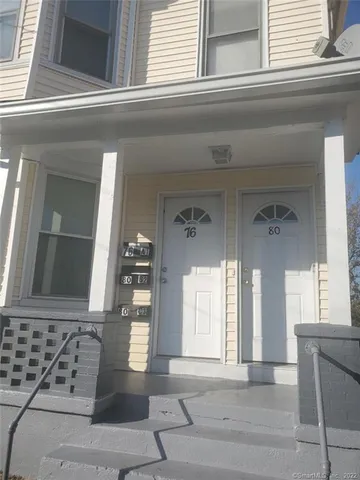 a view of a living room and entry way