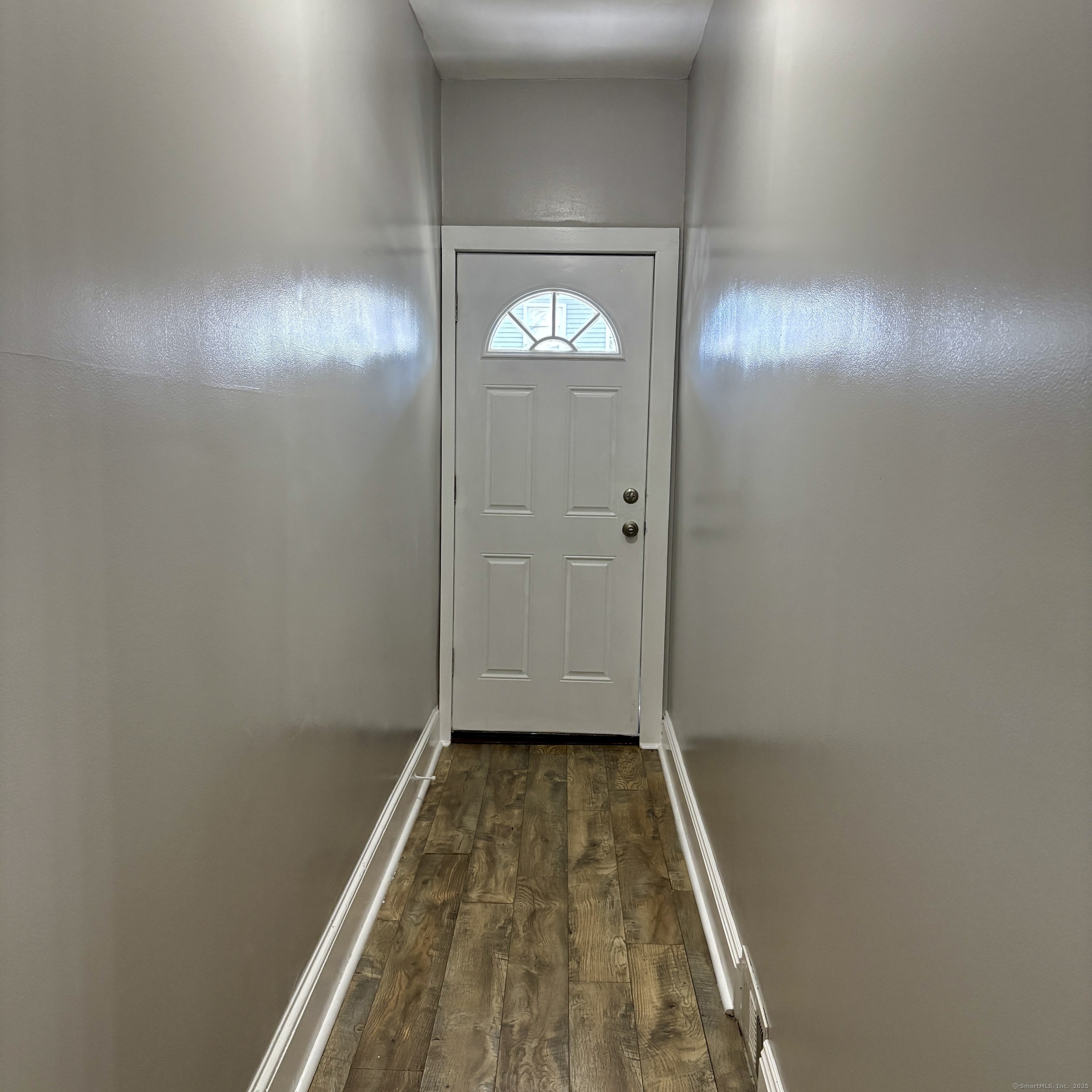 76 Commercial Street, Unit 1 Bridgeport, CT 06604 - Photo 2 of 9 view of room with window