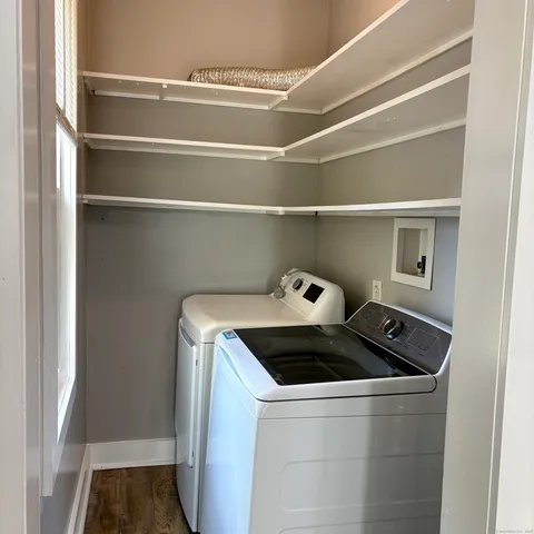 a utility room with washer and dryer