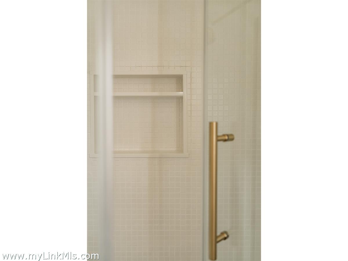 10 Centre Street Nantucket, MA 02554 - Photo 34 of 43 a picture of a room with a white wall