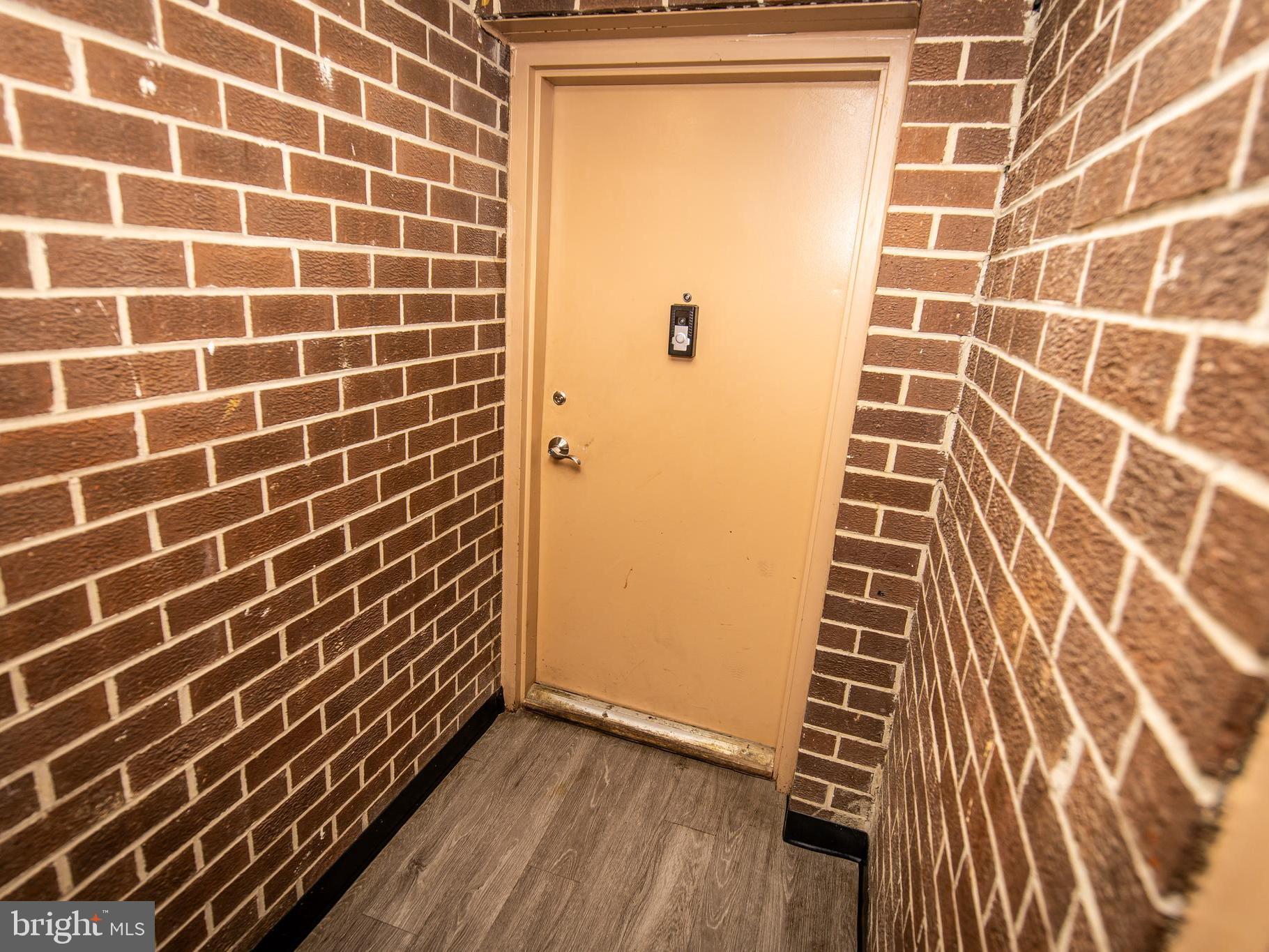 3934 Bel Pre Road, Unit 39342 Silver Spring, MD 20906 - Photo 27 of 30 a view of a door with wooden floor