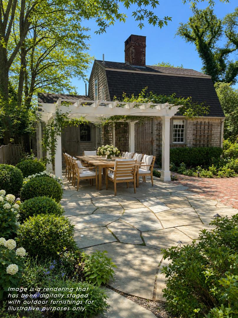 24 Milk Street Nantucket, MA 02554 - Photo 39 of 39 a view of a patio with table and chairs and potted plants