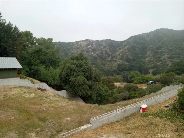 a view of mountains and valleys