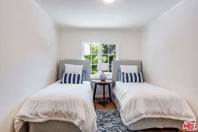 a view of a swimming pool with a yard