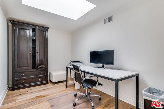 a view of a swimming pool with a yard