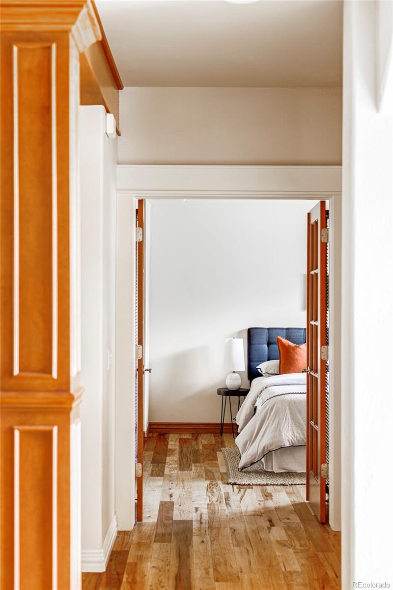 701 Leyden Street Denver, CO 80220 - Photo 21 of 42 a view of walk in closet with clothes and shoes