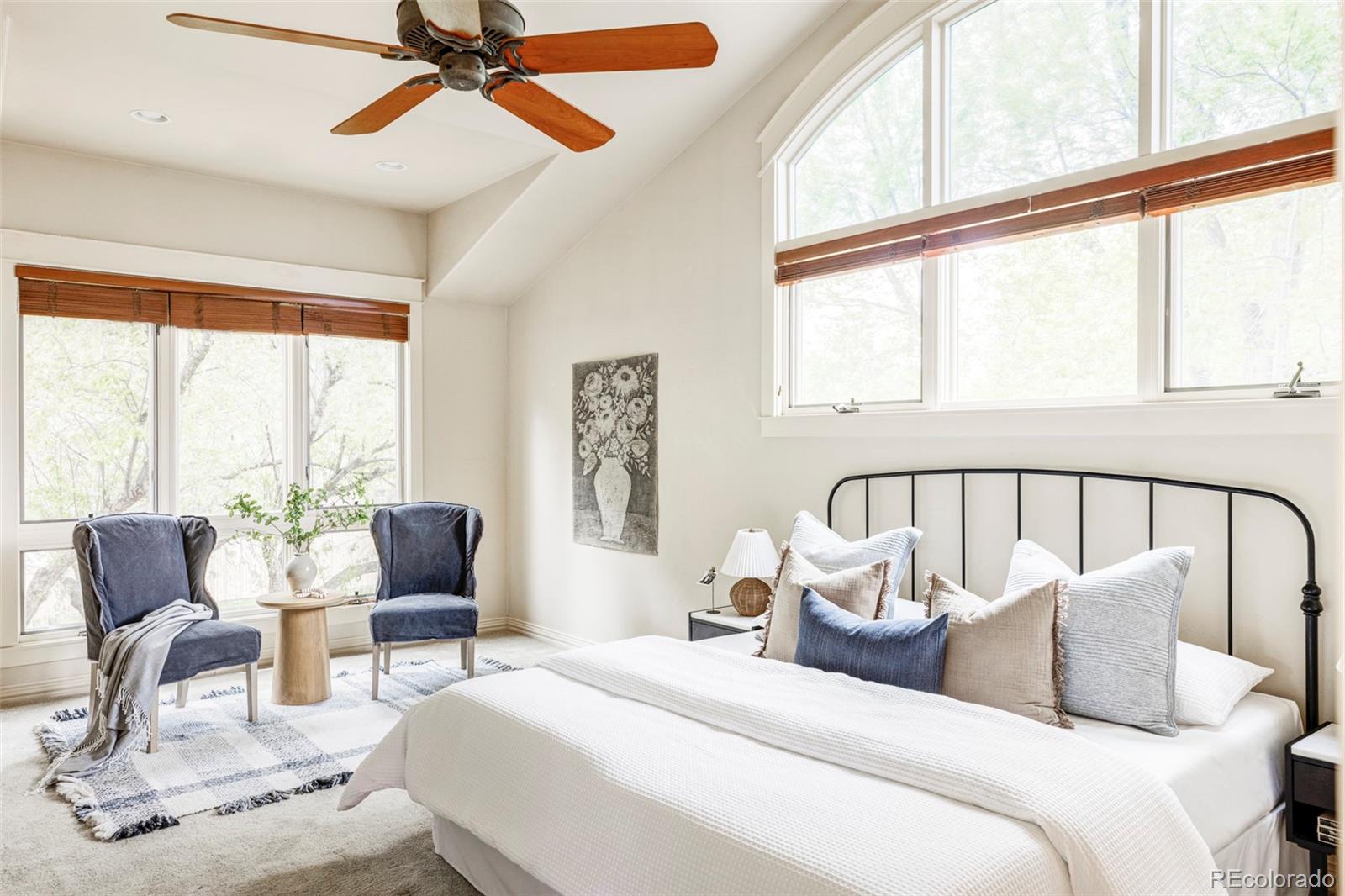 701 Leyden Street Denver, CO 80220 - Photo 26 of 42 a bedroom with a bed and glass window