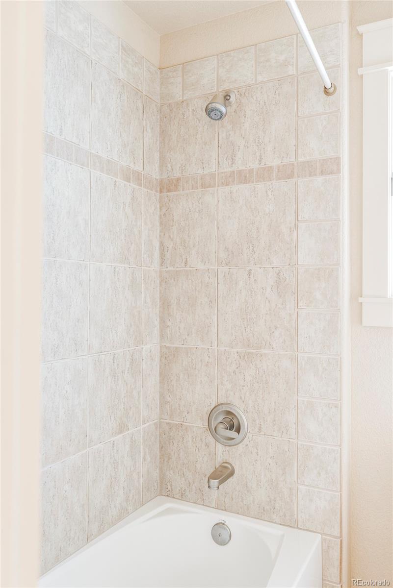 701 Leyden Street Denver, CO 80220 - Photo 34 of 42 a bathroom with a bathtub