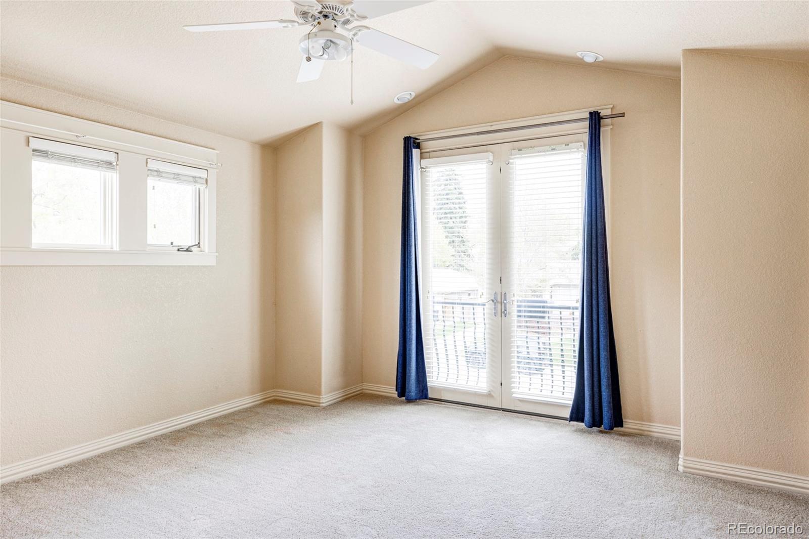 701 Leyden Street Denver, CO 80220 - Photo 35 of 42 an empty room with windows and closet