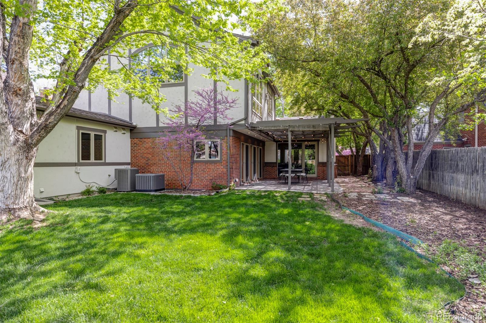 701 Leyden Street Denver, CO 80220 - Photo 42 of 42 a view of a house with a yard and tree