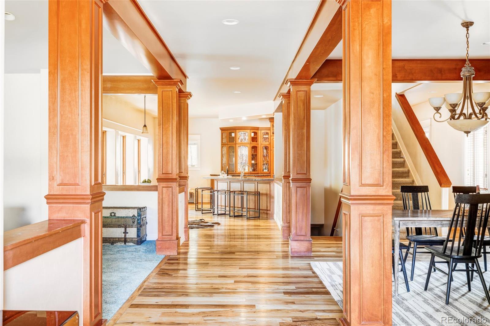 701 Leyden Street Denver, CO 80220 - Photo 5 of 42 a very nice looking living room with a large window and wooden floor