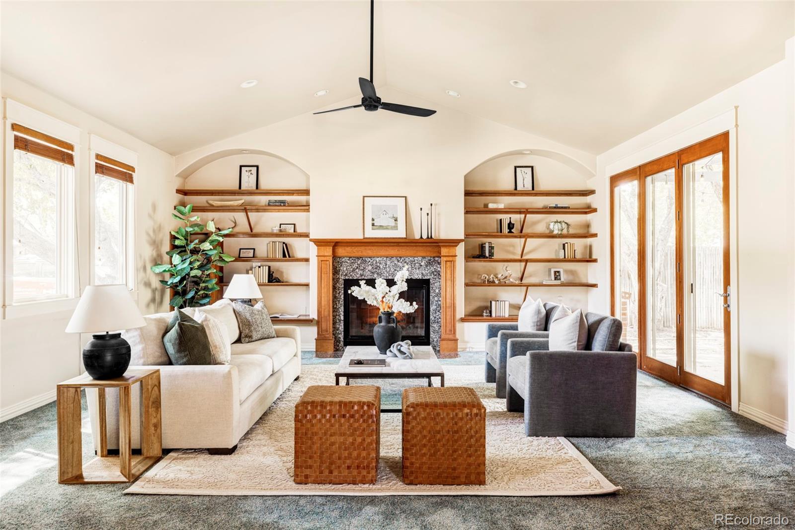 701 Leyden Street Denver, CO 80220 - Photo 6 of 42 a living room with furniture and a window