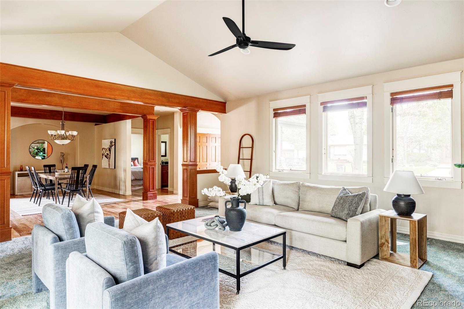 701 Leyden Street Denver, CO 80220 - Photo 9 of 42 a living room with furniture and a large window