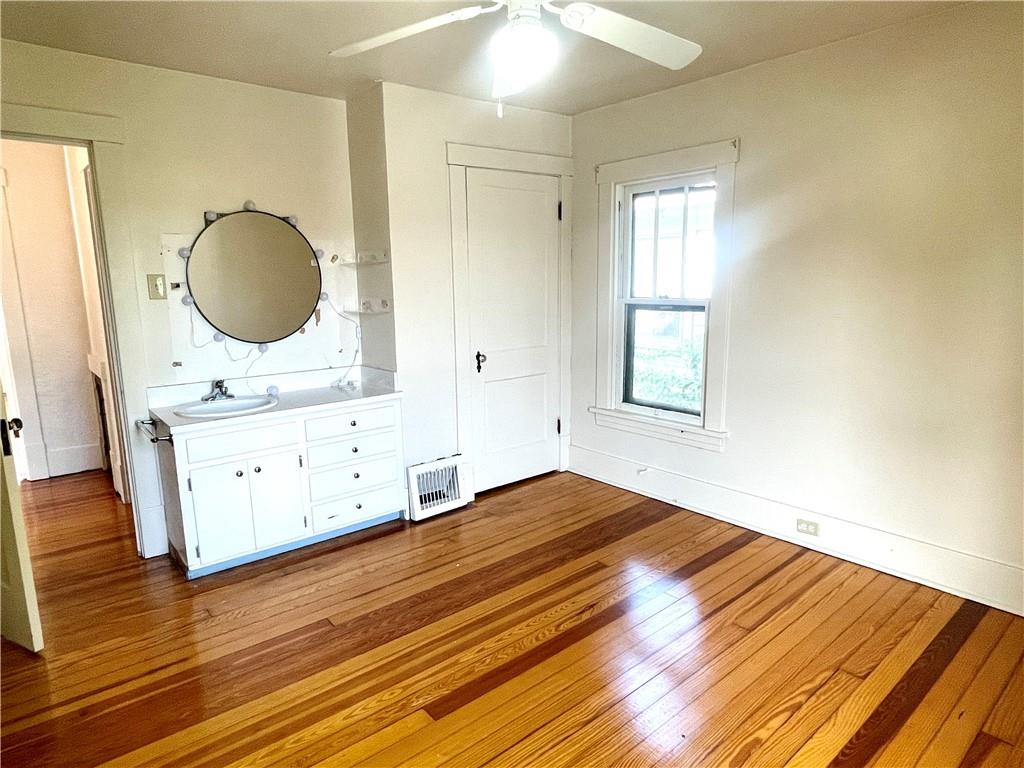 315 Spruce Street Butler, PA 16001 - Photo 25 of 38 a bedroom with a bed and a dresser
